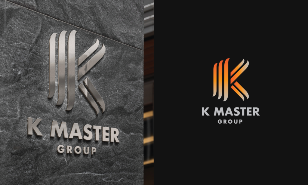 Kmaster Group 3D metal logo on a stone wall, beside the orange K Master logo